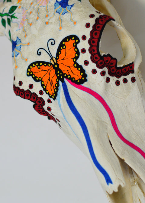 Cabeza con Mariposa